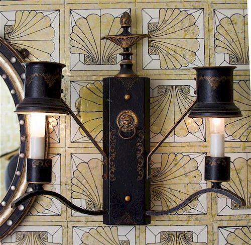 A Pair of Regency Style Black and Gilt Tole Two-Light Sconces Height 20 inches.