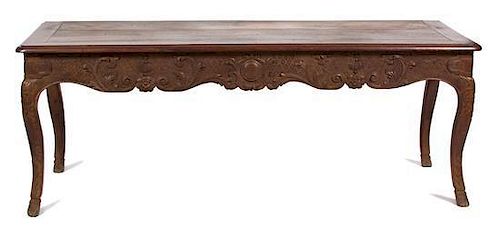 A French Provincial Carved Walnut Console Table Height 30 x width 78 x depth 27 inches.