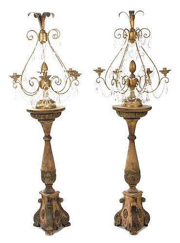 A Pair of Italian Six-Light Gilt Metal and Cut Crystal Candelabra Height 72 inches.