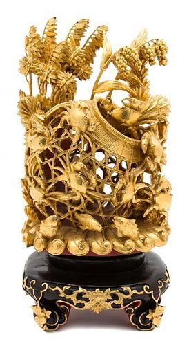 A Pair of Chinese Pierce Carved and Gilded Wood Sculptures Height 19 inches.