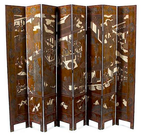 An Eight Panel Chinese Brown Coromandel Lacquer Screen Height 82 x width 15 1/2 inches.