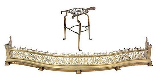 A Regency Style Pierced Brass Fire Fender and a Kettle Stand Width of fender 50 inches.