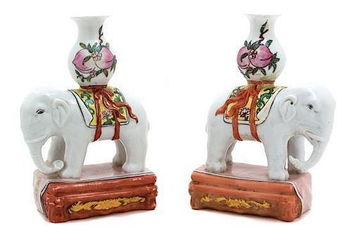 A Pair of Chinese Famille Rose Porcelain Caparisoned Elephants Height 12 inches.