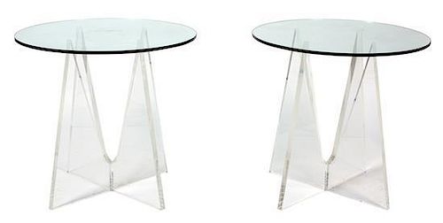 A Pair of Lucite Base Glass Top Side Tables Height 28 x diameter 29 inches.