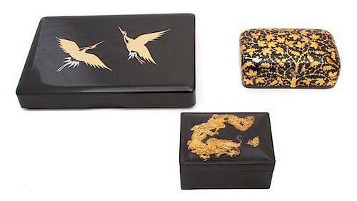 Three Japanese Black and Gilt Lacquer Boxes Width of largest 11 1/2 inches.