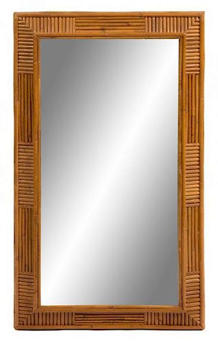 A Bamboo Framed Mirror Height 44 x width 25 inches.