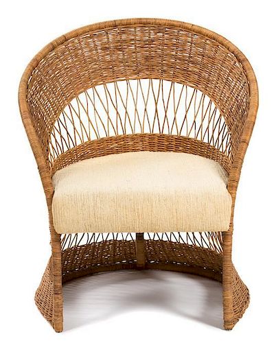 A Rattan Barrel Chair Height 35 inches.