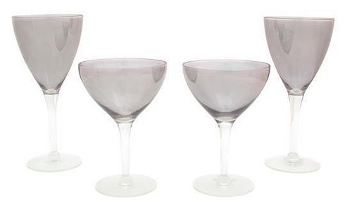 A Collection of Iridescent Glass Stemware Height of largest 7 1/2 inches.