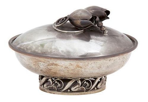 A Danish Silver Covered Oval Box, La Paglia Studio, having a floral finial, raised on a pierced floral decorated foot