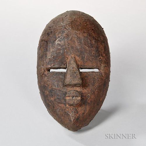 Copper Mask, West Africa, 19th century.  Provenance: Estate of June Ide Ellison, Boston, Massachusetts.