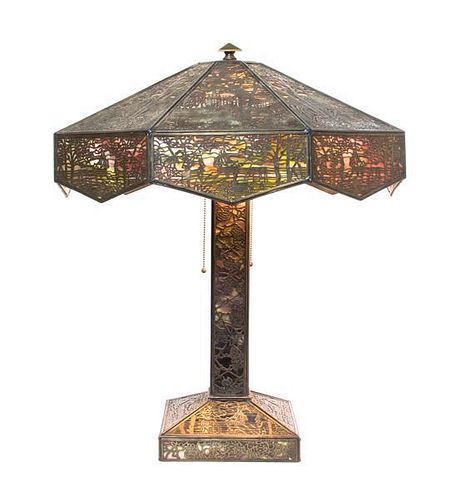 A Riviere Studios Lamp Filigree and Slag Glass Table Lamp, Diameter of shade 24 x height overall 24 inches.