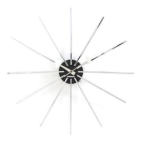 A George Nelson Chromed Wall Clock, American (1908-1986), for Howard Miller, Diameter 22 inches.