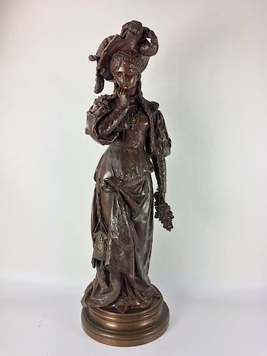 Bronze woman sighed by J. Guillot (Anatole Jean Guillot)
