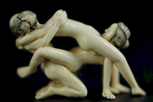 Vintage Netsuke carving of threesome erotic