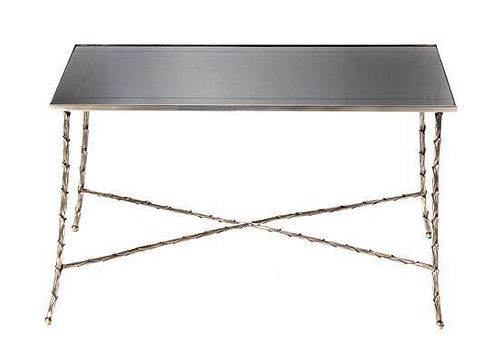 A Silvered Metal Low Table, in the manner of Maison Bagues, Height 18 1/2 x width 32 1/8 x depth 19 1/2 inches.