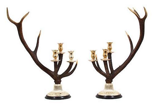 A Pair of English Silver Plate and Antler Three-Light Candelabra Height 26 x width 17 x depth 16 inches.