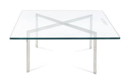 A Ludwig Mies van der Rohe Stainless Steel Barcelona Low Table, German (1886-1969), Height 16 3/4 x width 40 x depth 40 inches.