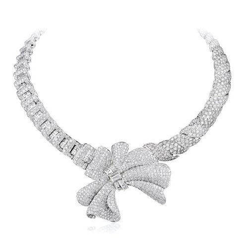 A Platinum Diamond Necklace and Brooch/Enhancer Set