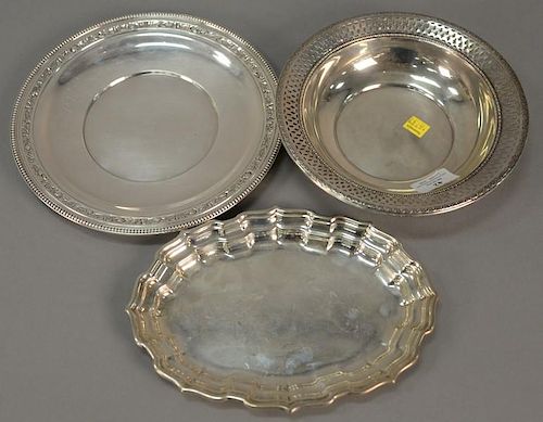 Three sterling silver pieces including oval tray, bowl, and plate. dia. 8 3/4in. & 10in., lg. 10in. 23.7 t oz.