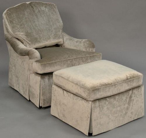 Baker upholstered chair and ottoman.