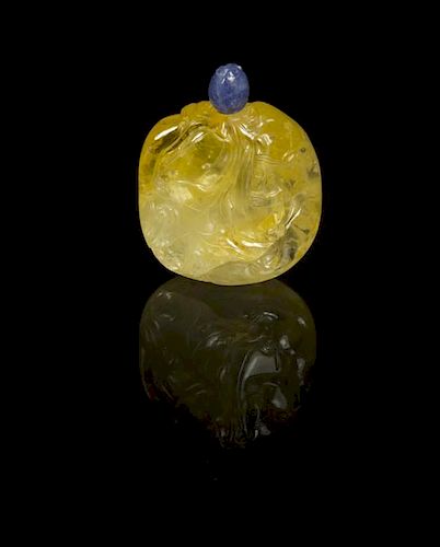 A Yellow Sapphire Snuff Bottle, Height 1 5/8 inches.