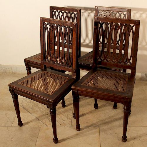 A set of four Louis XVI dining chairs