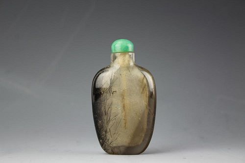 Chinese Rutilated Quartz snuffle (Haired Crystal) bottle with mid-green jade stopper. 19th century