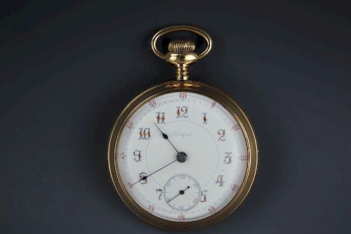 Vintage Rockford gold pocket watch with white ceramic dial with blue and red Arabic numerals and blue hands. No movements