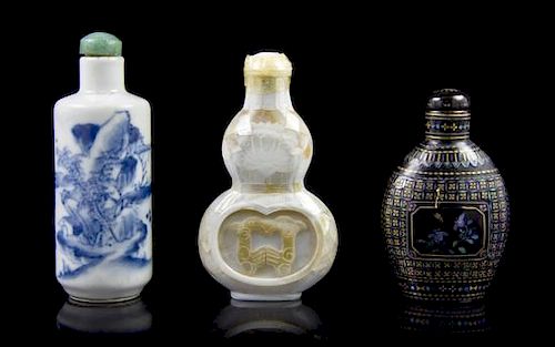 A Group of Three Snuff Bottles, Height of first overall 2 5/8 inches.