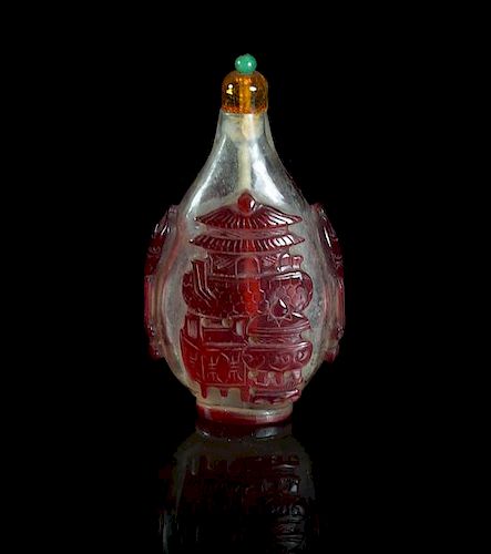 A Peking Glass Red Overlay Snuff Bottle, Height 3 inches.