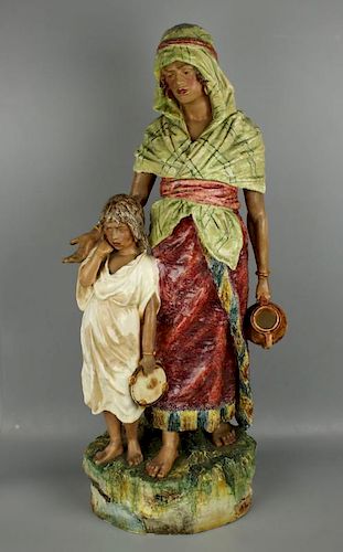27" antique Austrian figurine "Eastern Woman with Boy"