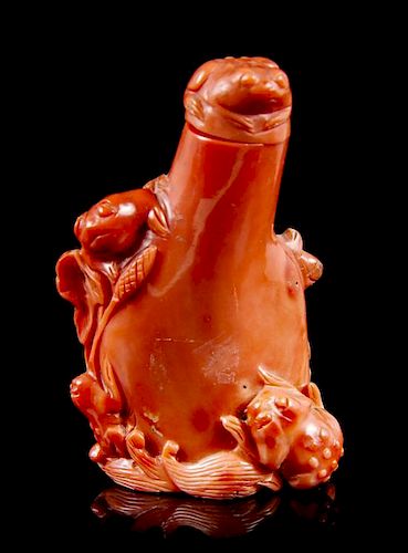 A Carved Coral Snuff Bottle, Height 2 1/2 inches.