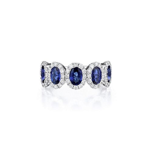 An 18K White Gold Sapphire and Diamond Ring