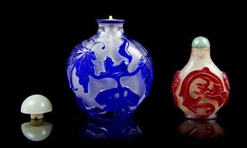 Two Peking Glass Snuff Bottles, Height of first bottle 2 3/4 inches.