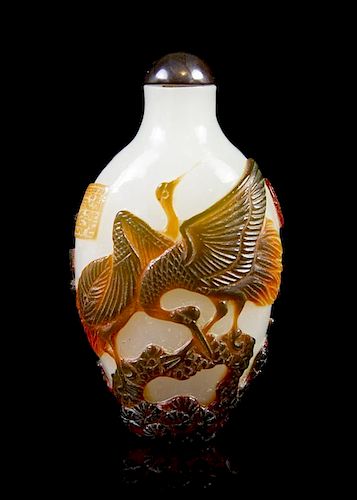 A Peking Glass Snuff Bottle, Height 2 1/2 inches.