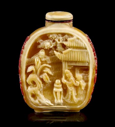 A Carved Hornbill Snuff Bottle, Height 2 3/8 inches.