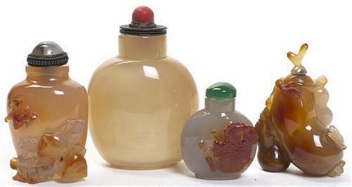 A Group of Four Agate Snuff Bottles, Height of tallest 3 1/16 inches.