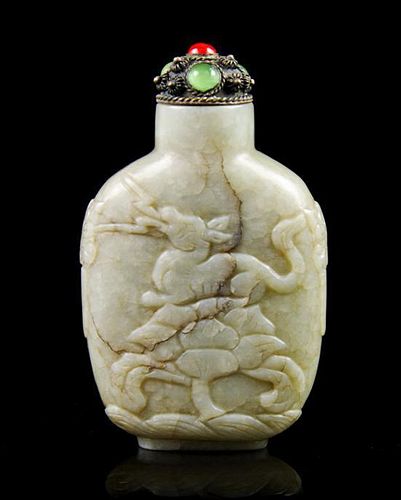 A Carved Soapstone Snuff Bottle, Height 2 1/2 inches.