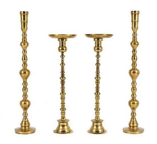 Two Pairs of Turkish Brass Candlesticks, Height of taller 38 1/4 inches.