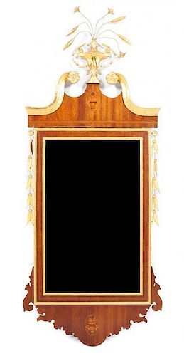 An American Mahogany and Pine Hepplewhite Mirror, New York, Height 59 1/2 inches.