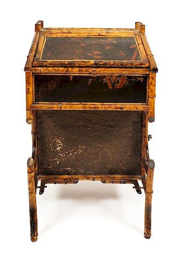 An Anglo-Colonial Bamboo Lacquered Davenport Desk, Height 36 x width 22 x depth 20 1/4 inches.