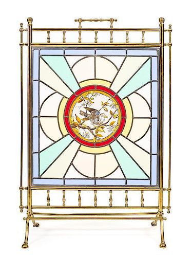 A Victorian Brass, Stained and Caned Glass Fireplace Screen, Height 35 1/4 x width 24 5/8 inches.