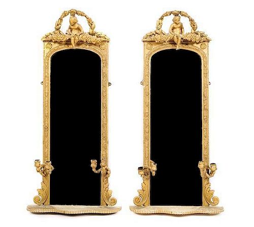 A Pair of Louis XV Style Gilt and Gesso Four-Light Girandole Mirrors, Height 43 x width 20 3/4 inches.