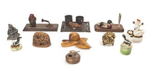 A Group of Eleven Figural Inkwells, Length of longest 7 7/8 inches.