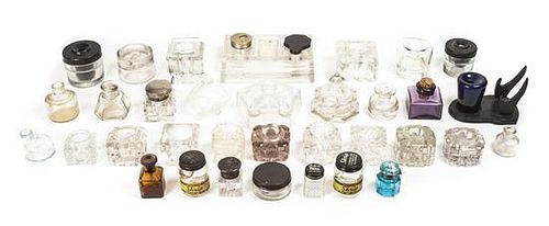 A Group of Thirty-Four Glass Inkwells and Bottles, Length of longest 7 1/2 inches.