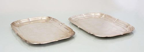 TWO CARTIER STERLING SILVER SERVING TRAYS IN THE 'WINDSOR' PATTERN