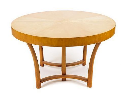 A Mid Century Modern Birch Extending Dining Table, Height 29 x diameter 48 inches.