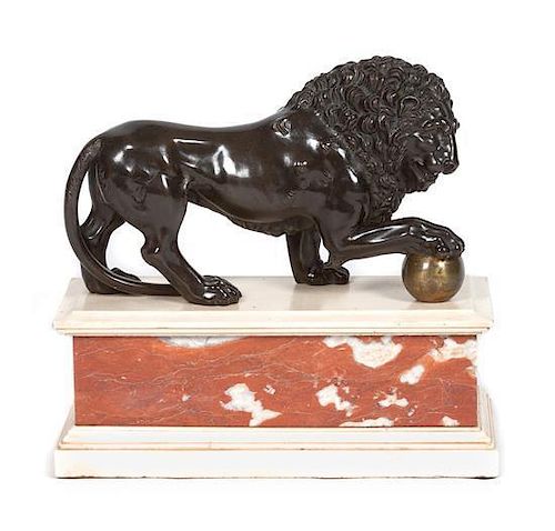 A Bronze Model of the Medici Lion Height 14 x width 15 x depth 6 3/4 inches.