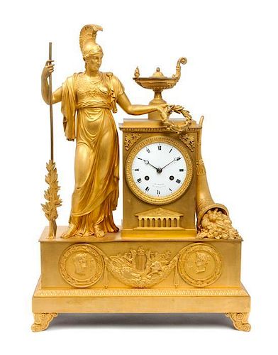 * A French Gilt Bronze Figural Clock Height 19 inches.