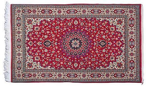 A Persian Style Rug 5 feet 8 inches x 3 feet 6 inches.